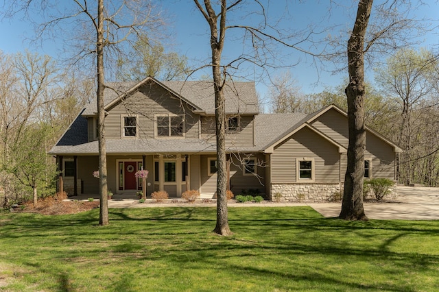 1125 Riverwood Dr SW, Oronoco, MN 55960 - view of front of property featuring a porch, a front yard, stone siding, and roof with shingles