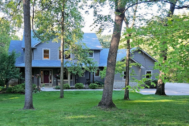 1125 Riverwood Dr SW, Oronoco, MN 55960 - view of front of home with a front lawn and a shingled roof