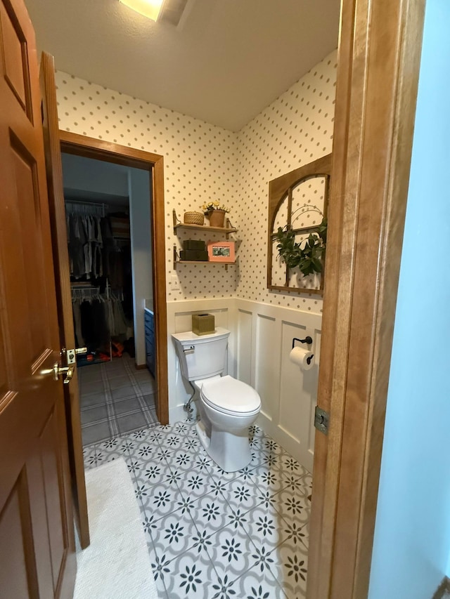 bathroom featuring toilet
