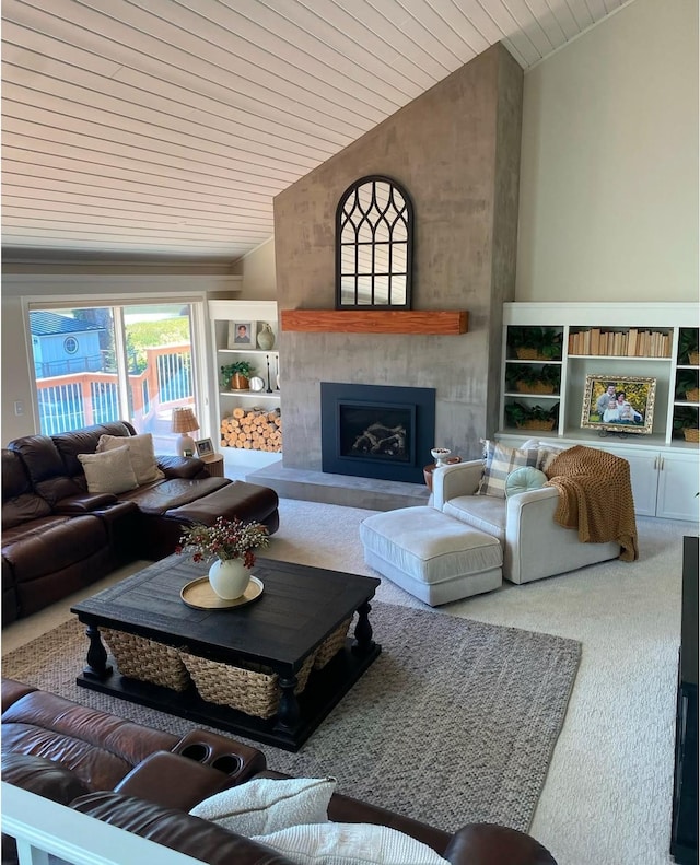 carpeted living area with lofted ceiling, a fireplace with raised hearth, and wood ceiling