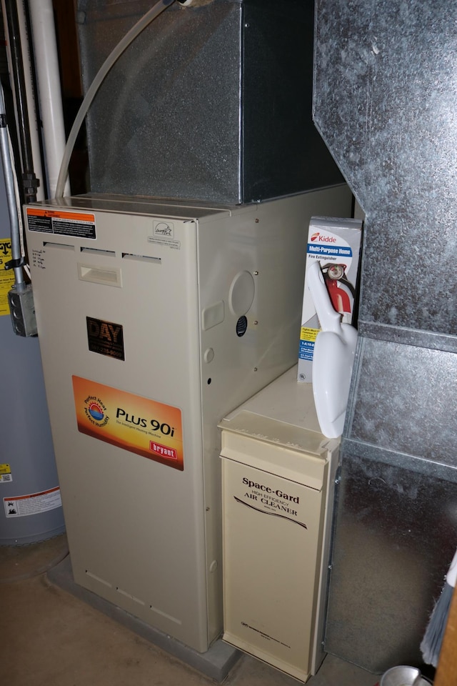 utility room with heating unit