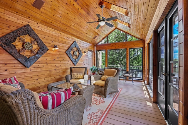 interior space with ceiling fan