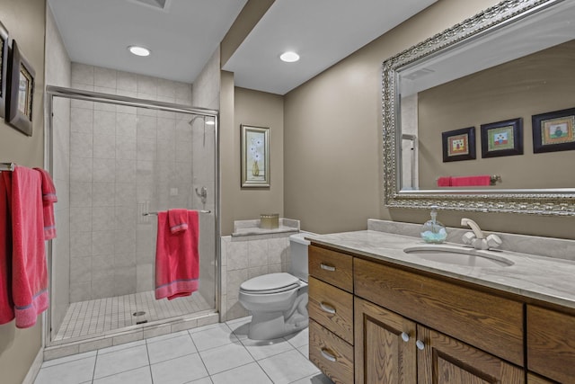 full bathroom with toilet, tile patterned floors, a shower stall, and vanity