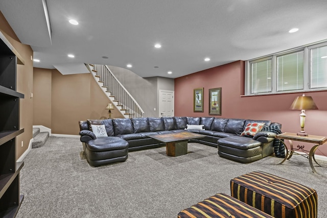 living room featuring baseboards, recessed lighting, carpet, and stairs