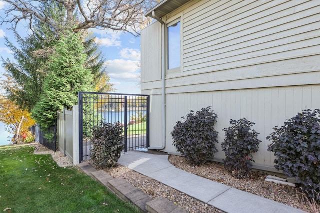 view of property exterior featuring a lawn