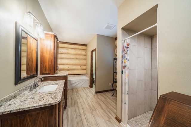 46174 County Highway 35, Vergas, MN 56587 - bathroom with rustic walls, a shower stall, a bath, wood finished floors, and vanity