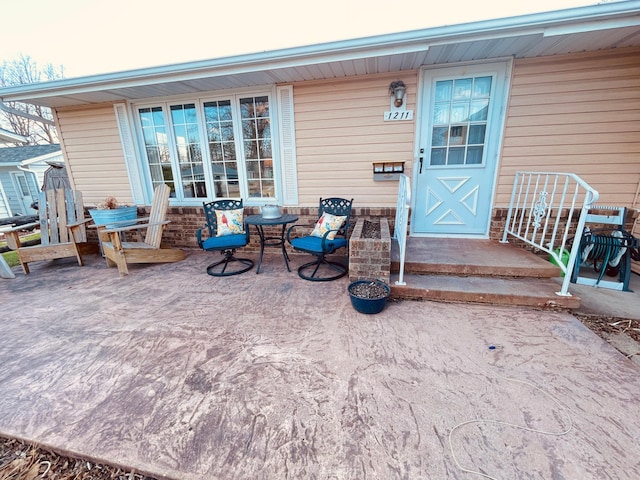 1211 Diagonal Rd, Worthington, MN 56187 - doorway to property featuring a patio area