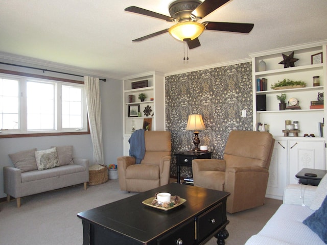 1211 Diagonal Rd, Worthington, MN 56187 - carpeted living area with crown molding, ceiling fan, and built in shelves