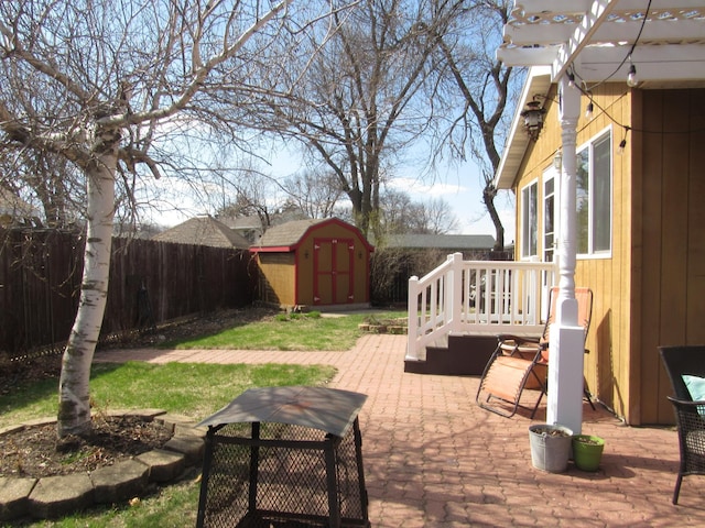 1211 Diagonal Rd, Worthington, MN 56187 - fenced backyard with a patio area