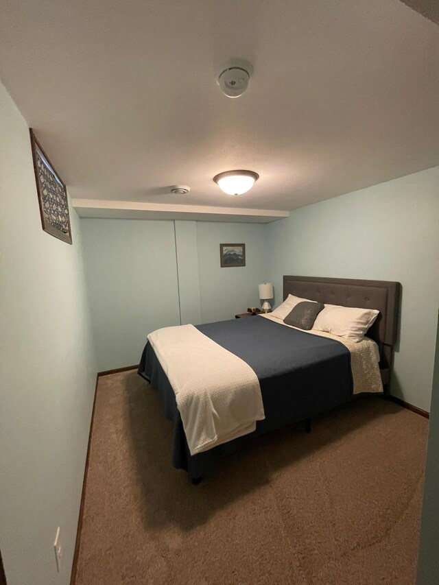 1211 Diagonal Rd, Worthington, MN 56187 - bedroom featuring carpet flooring and baseboards