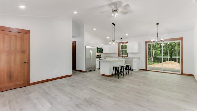 24888 65th Ave, Sigel Twp, WI 54727 - kitchen with stainless steel appliances, a chandelier, white cabinets, light countertops, and a ceiling fan