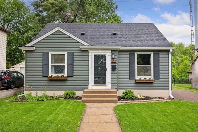 3011 Brunswick Ave S, Saint Louis Park, MN 55416 - bungalow-style home with a shingled roof and entry steps