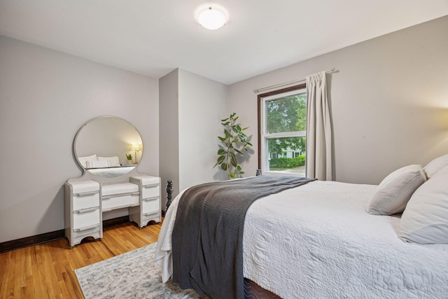 3011 Brunswick Ave S, Saint Louis Park, MN 55416 - bedroom featuring light wood-style flooring and baseboards