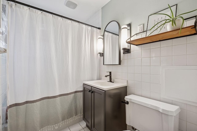 3011 Brunswick Ave S, Saint Louis Park, MN 55416 - bathroom with tile walls, toilet, vanity, curtained shower, and decorative backsplash