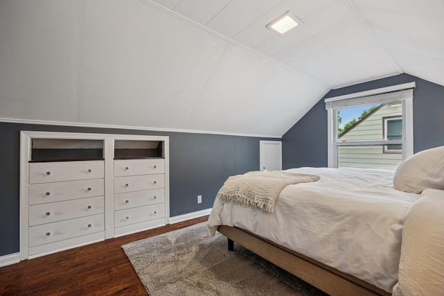 3011 Brunswick Ave S, Saint Louis Park, MN 55416 - bedroom featuring wood finished floors, lofted ceiling, and baseboards