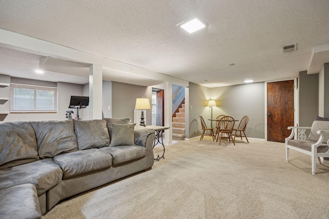 3011 Brunswick Ave S, Saint Louis Park, MN 55416 - carpeted living room featuring a textured ceiling, stairs, and baseboards