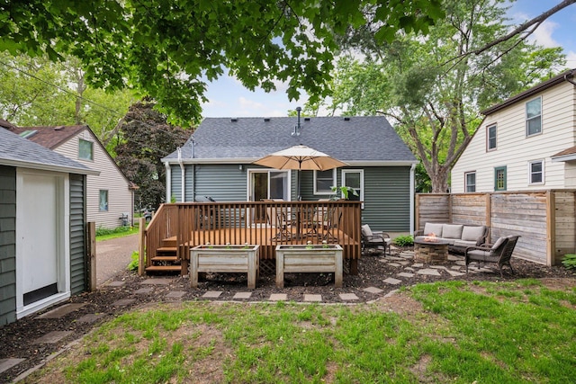 3011 Brunswick Ave S, Saint Louis Park, MN 55416 - rear view of property with an outdoor living space with a fire pit, a deck, and a shingled roof
