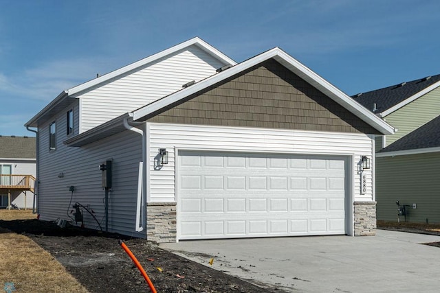 garage featuring driveway