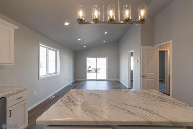 unfurnished dining area with dark wood-type flooring, baseboards, recessed lighting, and high vaulted ceiling
