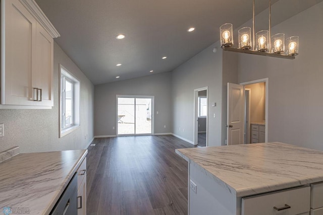 kitchen with white cabinets, open floor plan, dark wood finished floors, recessed lighting, and lofted ceiling