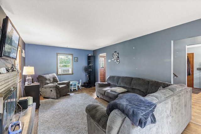 7716 Orchard Ave N, Brooklyn Park, MN 55443 - living area with wood finished floors and a fireplace