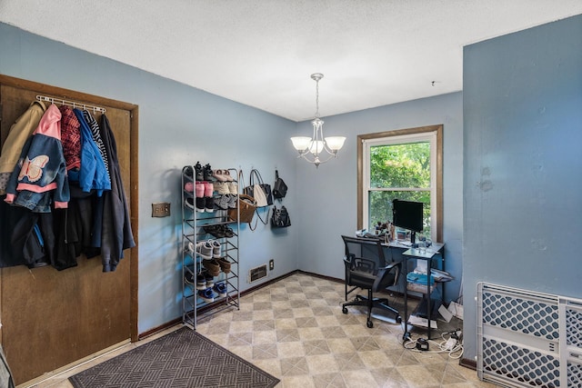 7716 Orchard Ave N, Brooklyn Park, MN 55443 - office area with a chandelier and baseboards