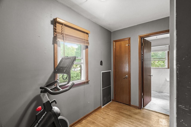 7716 Orchard Ave N, Brooklyn Park, MN 55443 - exercise room with light wood-style floors
