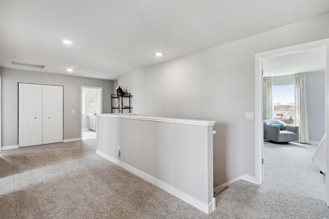 8337 Brumby Trl, Woodbury, MN 55129 - hall with baseboards, carpet, an upstairs landing, and recessed lighting