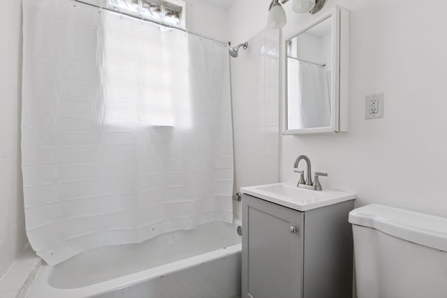 1208 University Ave NE, Minneapolis, MN 55413 - bathroom with vanity, shower / tub combo with curtain, and toilet