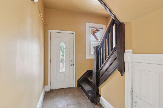 1208 University Ave NE, Minneapolis, MN 55413 - foyer with stairway and baseboards