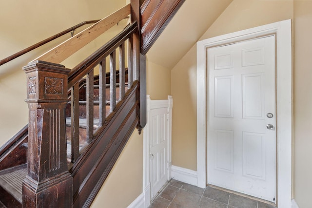 1208 University Ave NE, Minneapolis, MN 55413 - staircase featuring tile patterned flooring and baseboards