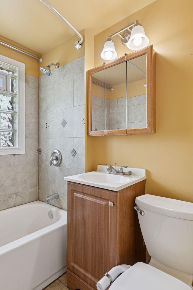 1208 University Ave NE, Minneapolis, MN 55413 - bathroom featuring toilet, shower / tub combination, and vanity