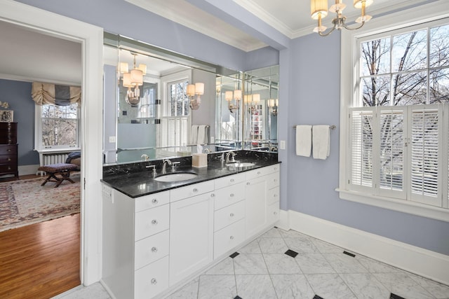 2774 Lake Of The Isles Pkwy, Minneapolis, MN 55416 - bathroom featuring a chandelier, crown molding, and vanity