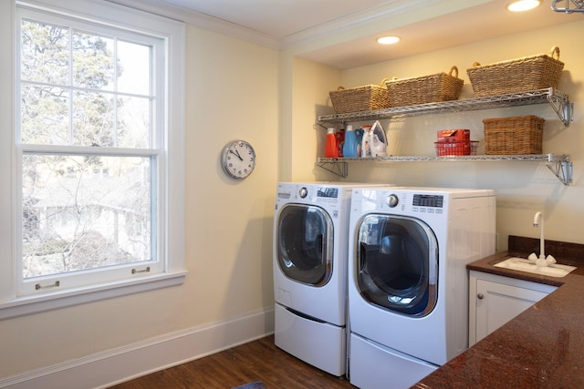 2774 Lake Of The Isles Pkwy, Minneapolis, MN 55416 - washroom with washer and clothes dryer, dark wood-type flooring, crown molding, and recessed lighting