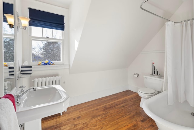 2774 Lake Of The Isles Pkwy, Minneapolis, MN 55416 - full bath with radiator heating unit, hardwood / wood-style flooring, a shower with shower curtain, and vaulted ceiling