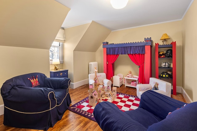 2774 Lake Of The Isles Pkwy, Minneapolis, MN 55416 - living area with radiator heating unit, wood finished floors, and ornamental molding