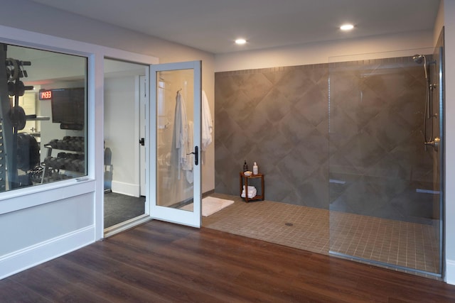 2774 Lake Of The Isles Pkwy, Minneapolis, MN 55416 - bathroom featuring wood finished floors, a tile shower, and recessed lighting