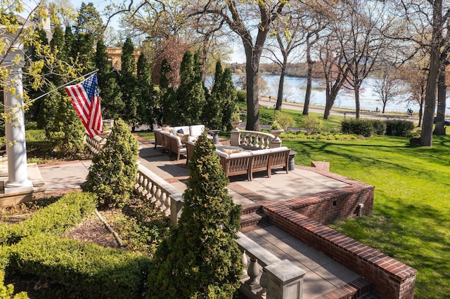 2774 Lake Of The Isles Pkwy, Minneapolis, MN 55416 - deck featuring an outdoor hangout area, a water view, and a yard