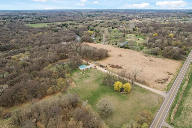 aerial view with a wooded view