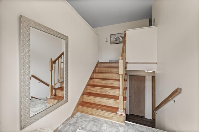 staircase with visible vents