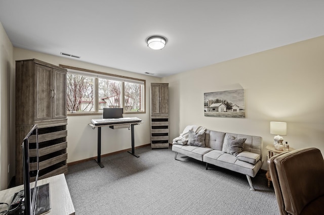 carpeted home office with baseboards and visible vents