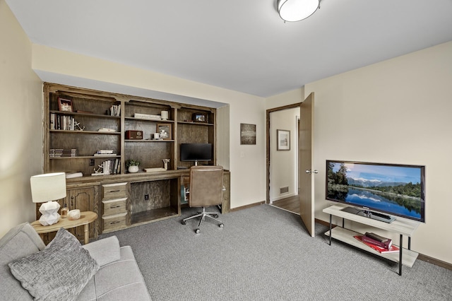 office featuring baseboards and carpet