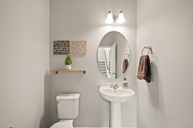 bathroom featuring toilet