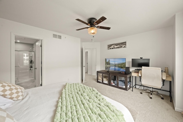 carpeted bedroom with ceiling fan, visible vents, and connected bathroom
