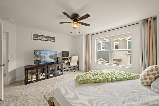 bedroom featuring a ceiling fan and carpet floors