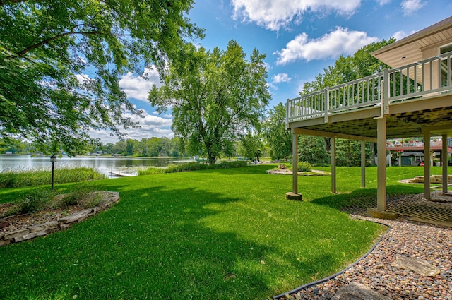 926 Kohlman Ln, Maplewood, MN 55109 - view of green lawn with a deck with water view