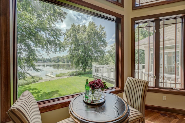 926 Kohlman Ln, Maplewood, MN 55109 - sunroom featuring a water view and plenty of natural light