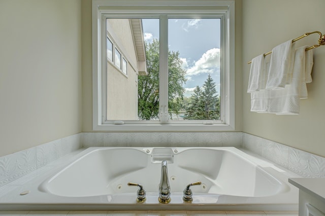 926 Kohlman Ln, Maplewood, MN 55109 - bathroom featuring healthy amount of natural light and a jetted tub