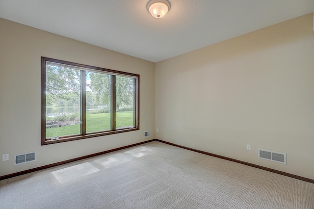 926 Kohlman Ln, Maplewood, MN 55109 - spare room with light colored carpet