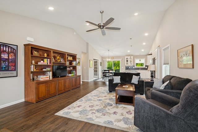 9769 Jeremiah Ct NE, Hanover, MN 55341 - living area with high vaulted ceiling, dark wood finished floors, a ceiling fan, baseboards, and recessed lighting